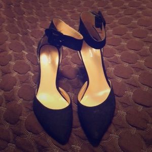 Black suede pumps